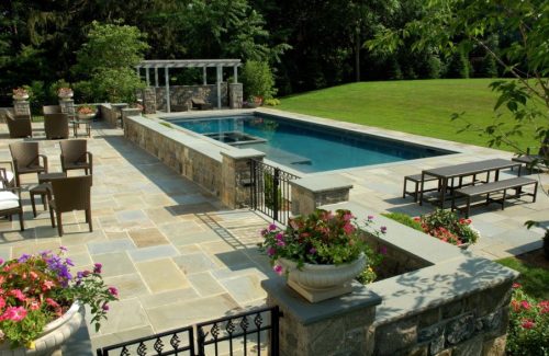 patio paver installation around pool in Chesapeake